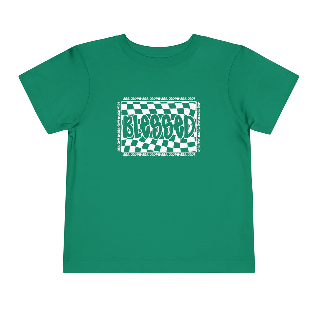 Blessed Toddler Tee: A green t-shirt with white text, designed for toddlers, made of 100% Airlume combed cotton for comfort.