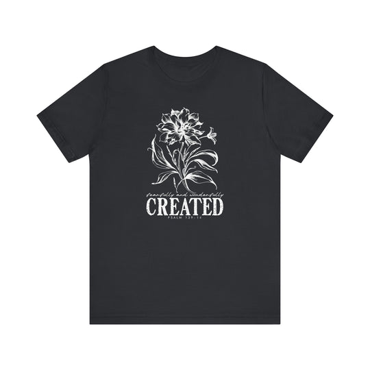 Unisex jersey short sleeve tee, titled Created Tee, features a classic crew neckline and tapered shoulders for a comfortable fit, made from soft, breathable cotton.