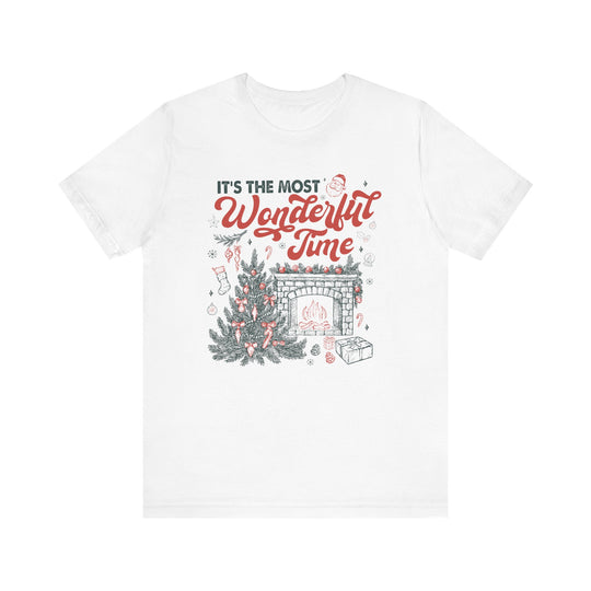 Most Wonderful Time of the Year Tee with festive Christmas scene, featuring a decorated tree, fireplace, and gifts. Retro-inspired, soft cotton, unisex fit.