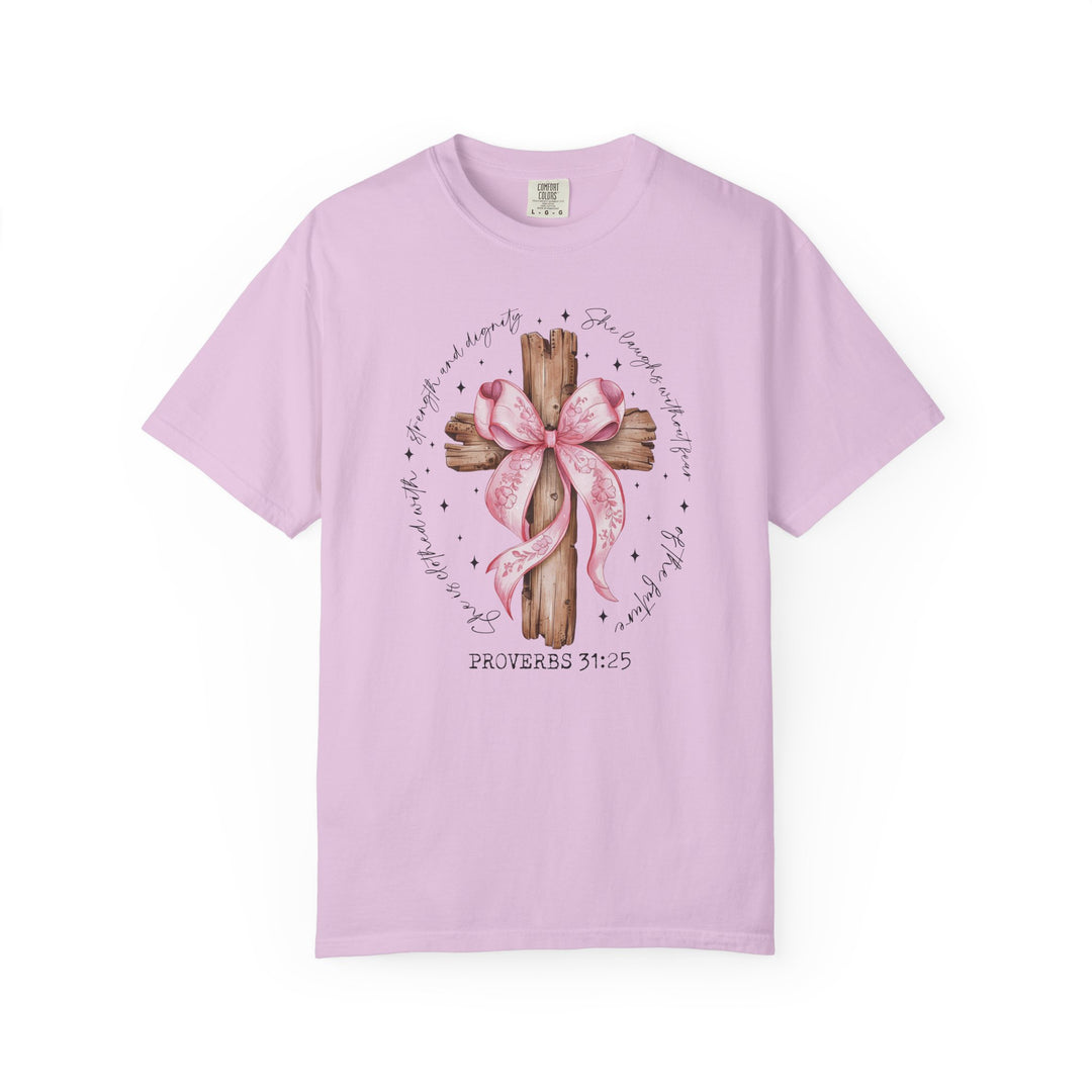 Proverbs 31:25 Tee featuring a rustic cross with a pink ribbon and inspirational verse, offering a relaxed fit in various sizes for comfort and style.