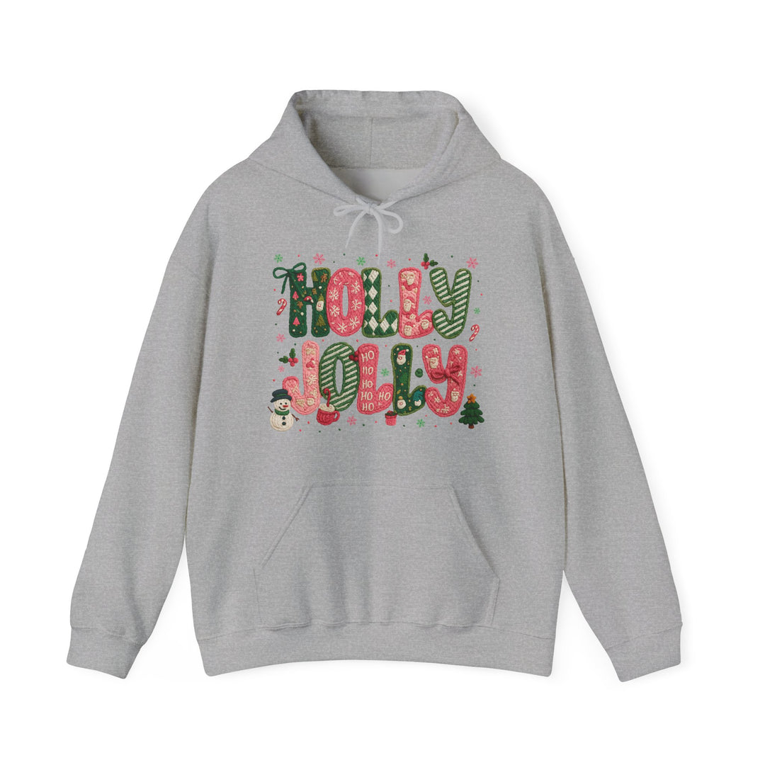Light-gray Holly Jolly hoodie with festive red and green graphic, featuring holiday icons and kangaroo pocket, designed for cozy warmth and style.