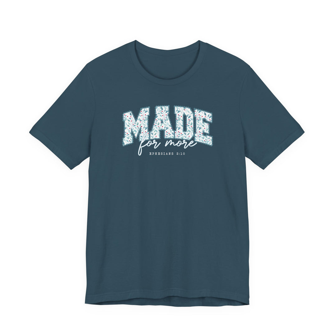 Unisex deep teal t-shirt with MADE for more and EPHESIANS 2:10 on chest. Classic fit, soft cotton, floral pattern, and flowing script.