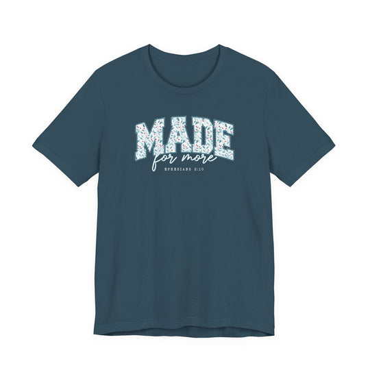 Unisex deep teal t-shirt with MADE for more and EPHESIANS 2:10 on chest. Classic fit, soft cotton, floral pattern, and flowing script.