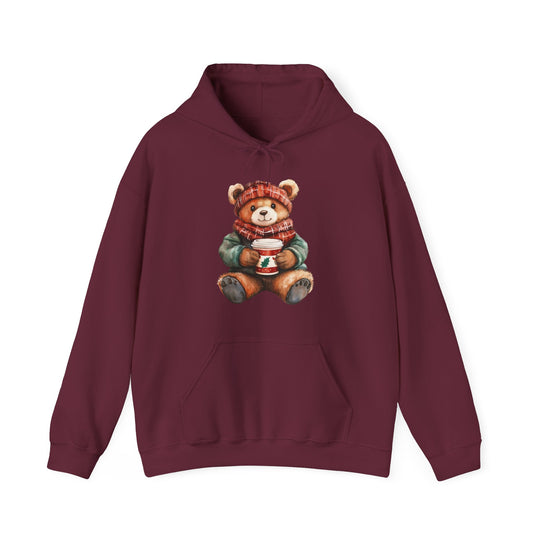 Burgundy hoodie featuring a winter-themed teddy bear illustration, showcasing a festive design with a kangaroo pocket, ideal for cozy, stylish wear.