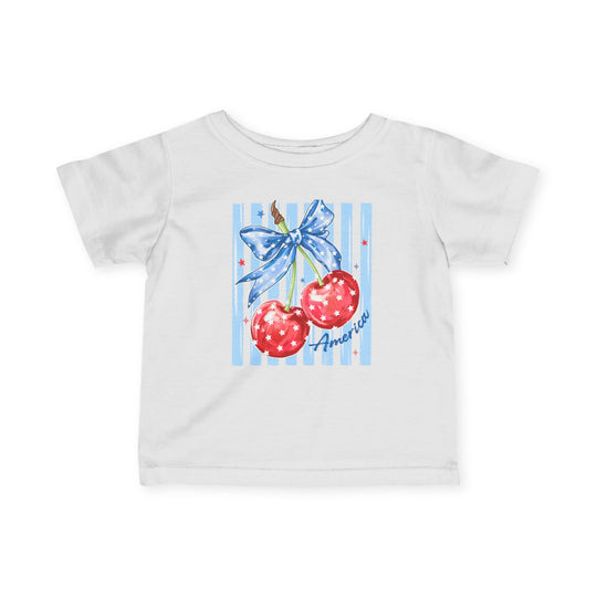 American Cherry Baby Tee: A white toddler T-shirt with an Americana-themed graphic featuring star-spangled cherries and America script, perfect for stylish, comfortable, infant wear.