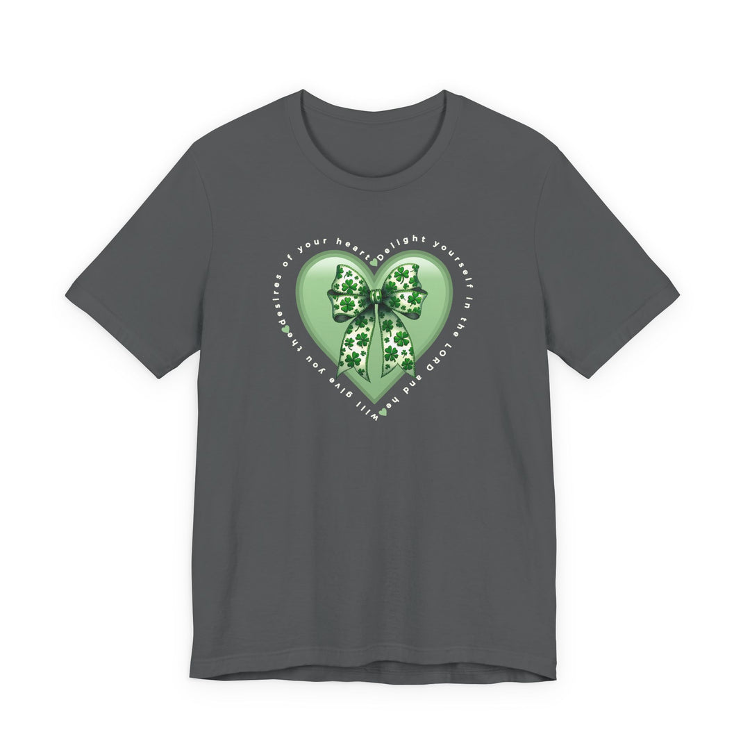 Heather-charcoal T-shirt featuring a glossy light-green heart with a bow and clovers, encircled by Psalm 37:4 text.