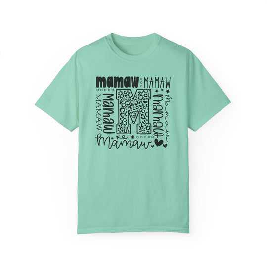 A customizable Mamaw Tee in green with black text, made of 100% ring-spun cotton. Features a relaxed fit, double-needle stitching, and no side-seams for durability and comfort. Ideal for daily wear.