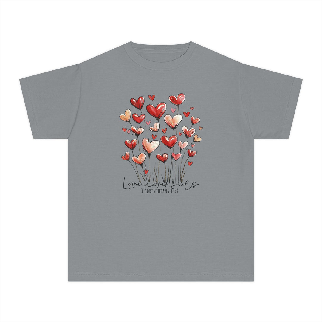 Heather-gray Love Never Fails Kids Tee featuring heart blooms graphic and scripture reference, ideal for active kids with its soft, comfortable 100% cotton classic fit.