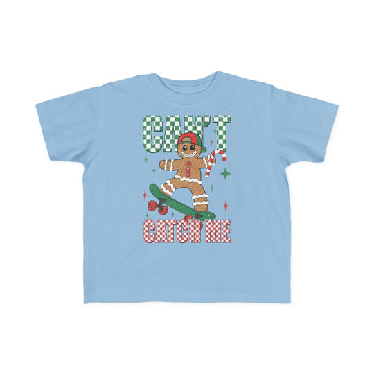 Can't Catch Me Toddler Tee featuring a gingerbread man on a skateboard with festive text, designed for comfort and durability, ideal for toddlers' adventures.