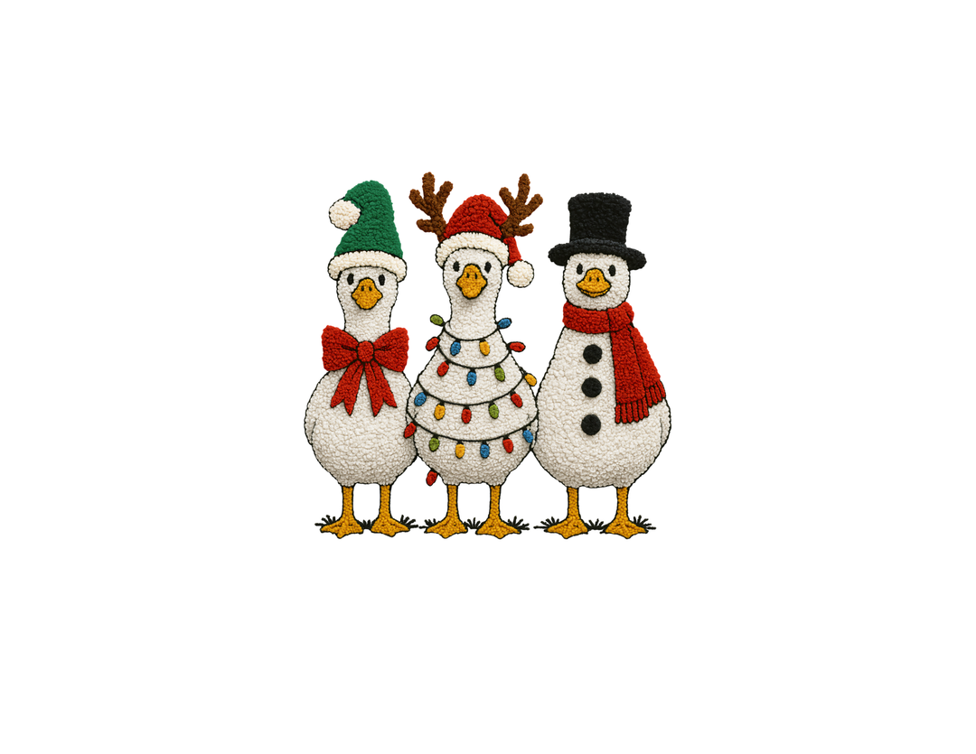 Christmas Geese Toddler Tee featuring three festive birds: one in a Santa hat, another with reindeer antlers, and the third as a snowman. Ideal for sensitive toddler skin.