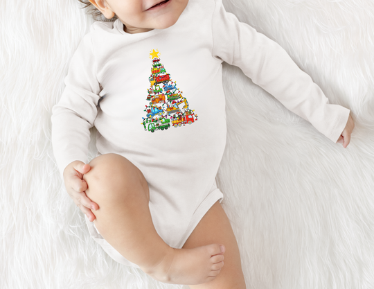 Baby in Christmas Truck Tree Onesie, lying on a soft surface, showcasing toy vehicle tree design with string lights and star, perfect for comfort and style.