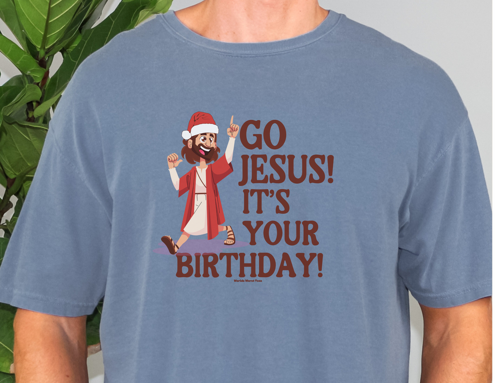 A relaxed-fit Go Jesus it's your birthday Tee sweatshirt in garment-dyed fleece, featuring a rolled-forward shoulder and back neck patch. Made of 80% ring-spun cotton and 20% polyester. Sizes: S-4XL.