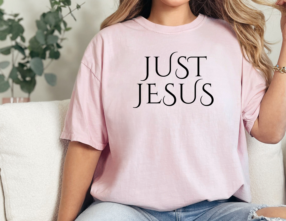 A classic unisex jersey tee, the Just Jesus Tee from Worlds Worst Tees. Soft cotton, ribbed knit collar, and shoulder taping for a comfortable fit. Available in various sizes.