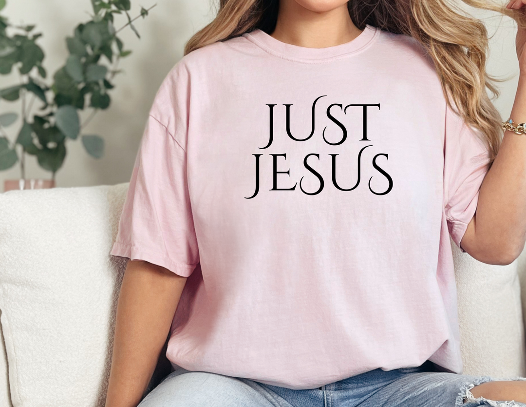 A classic unisex jersey tee, the Just Jesus Tee from Worlds Worst Tees. Soft cotton, ribbed knit collar, and shoulder taping for a comfortable fit. Available in various sizes.