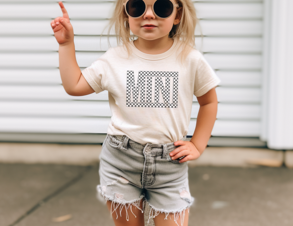 A kid's tee shirt by Vans Mini Kids Tee, crafted from soft combed cotton for comfort and agility. Classic fit, light fabric, ideal for active days.