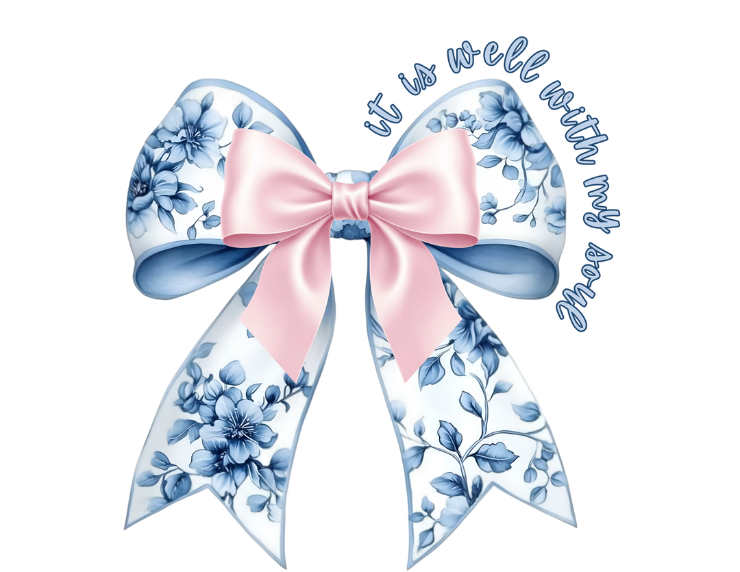 It is Well With My Soul Long Sleeve Tee with a pink satin bow and floral ribbon graphic, made of soft, 100% ring-spun cotton for comfort.