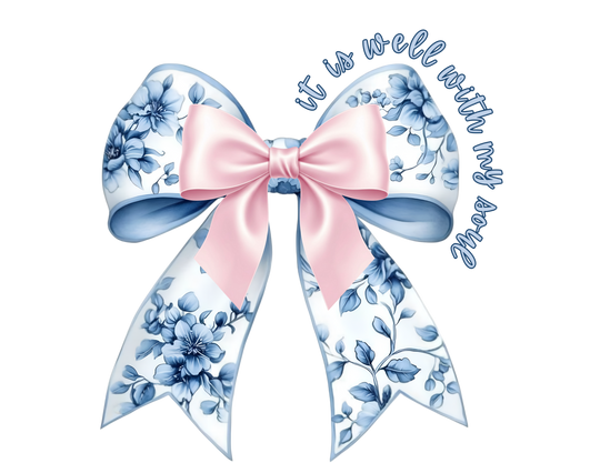 It is Well With My Soul Long Sleeve Tee with a pink satin bow and floral ribbon graphic, made of soft, 100% ring-spun cotton for comfort.