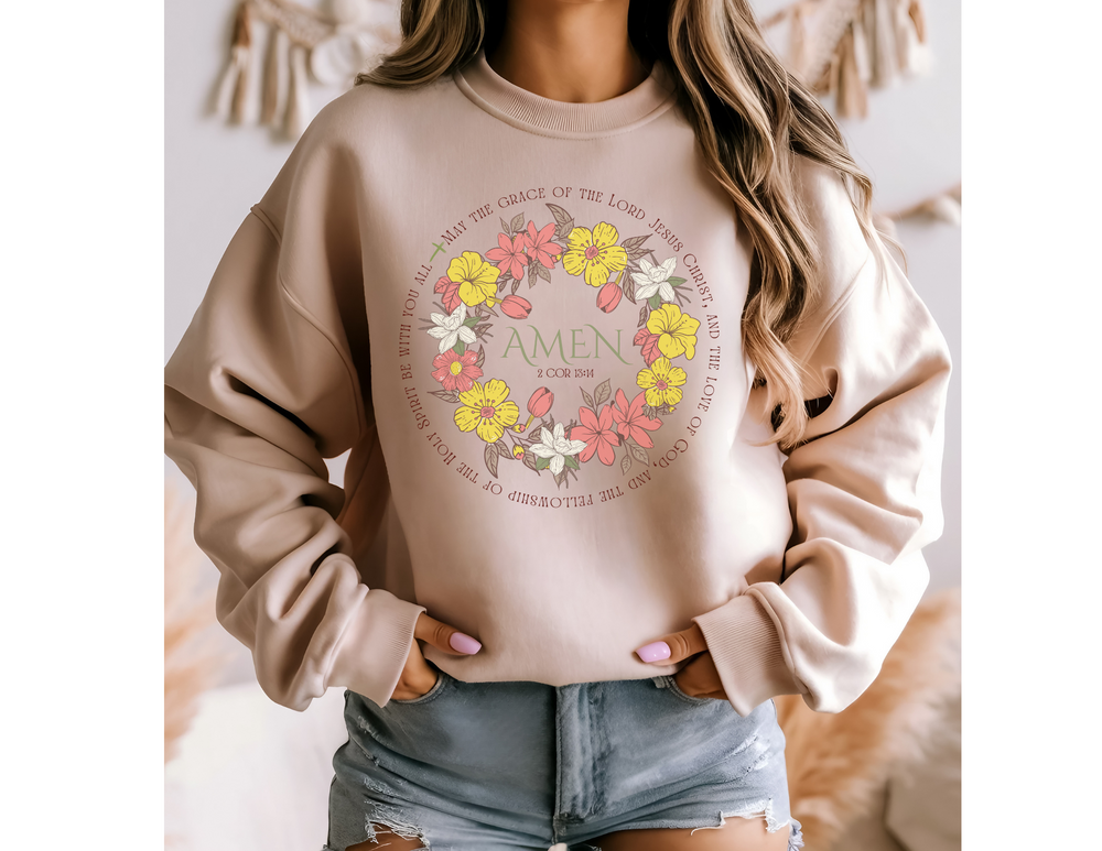 Close-up of a woman wearing the Amen Crew unisex heavy blend sweatshirt, showcasing its comfortable fit and ribbed crew neckline.