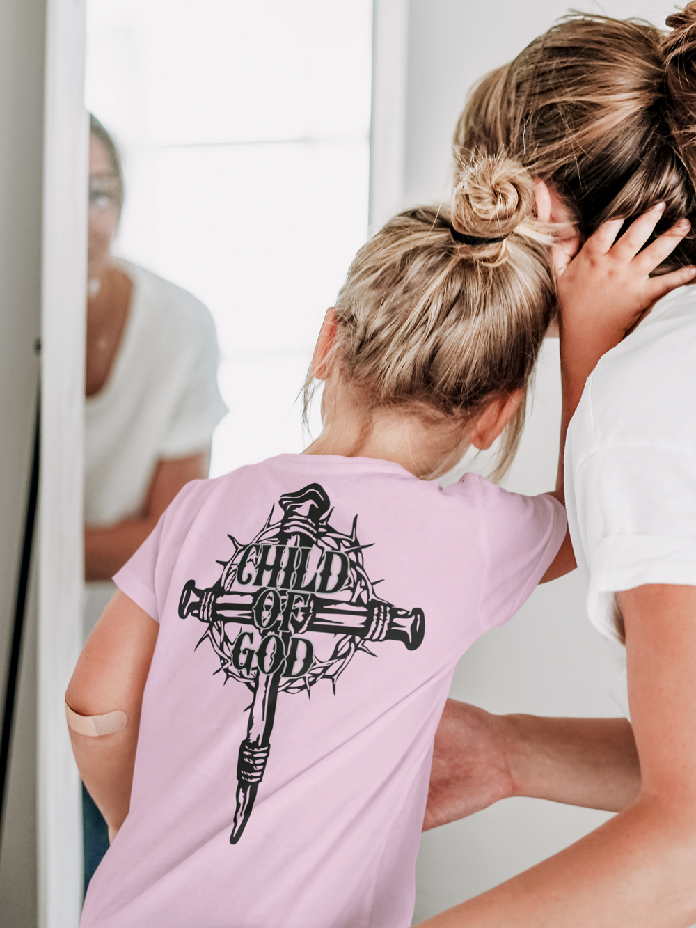 A child of God tee, perfect for toddlers, featuring a durable print on soft 100% cotton fabric. Classic fit with tear-away label, ideal for sensitive skin. Sizes: 2T, 3T, 4T, 5-6T.
