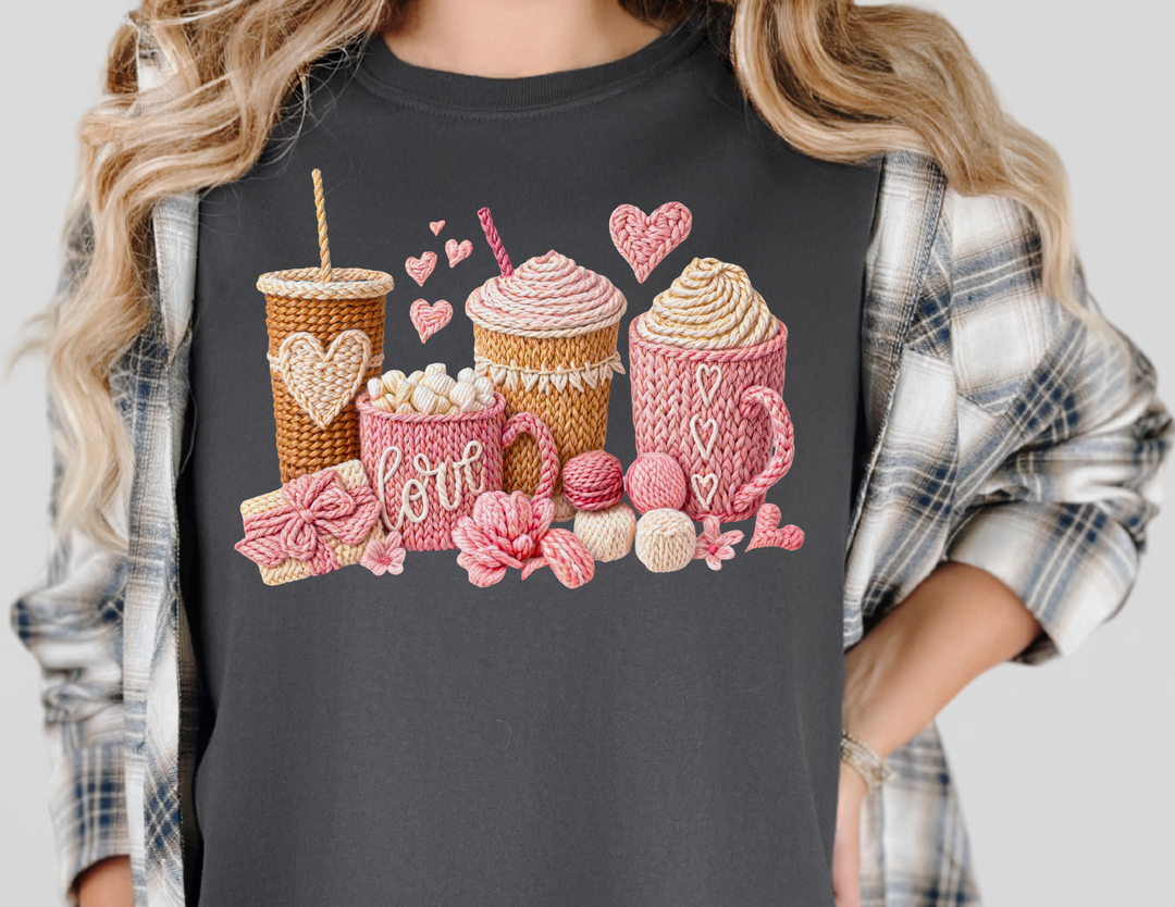 Coffee Love Tee featuring a cozy, yarn-inspired graphic with mugs, hearts, and knitting motifs, perfect for craft and coffee enthusiasts.
