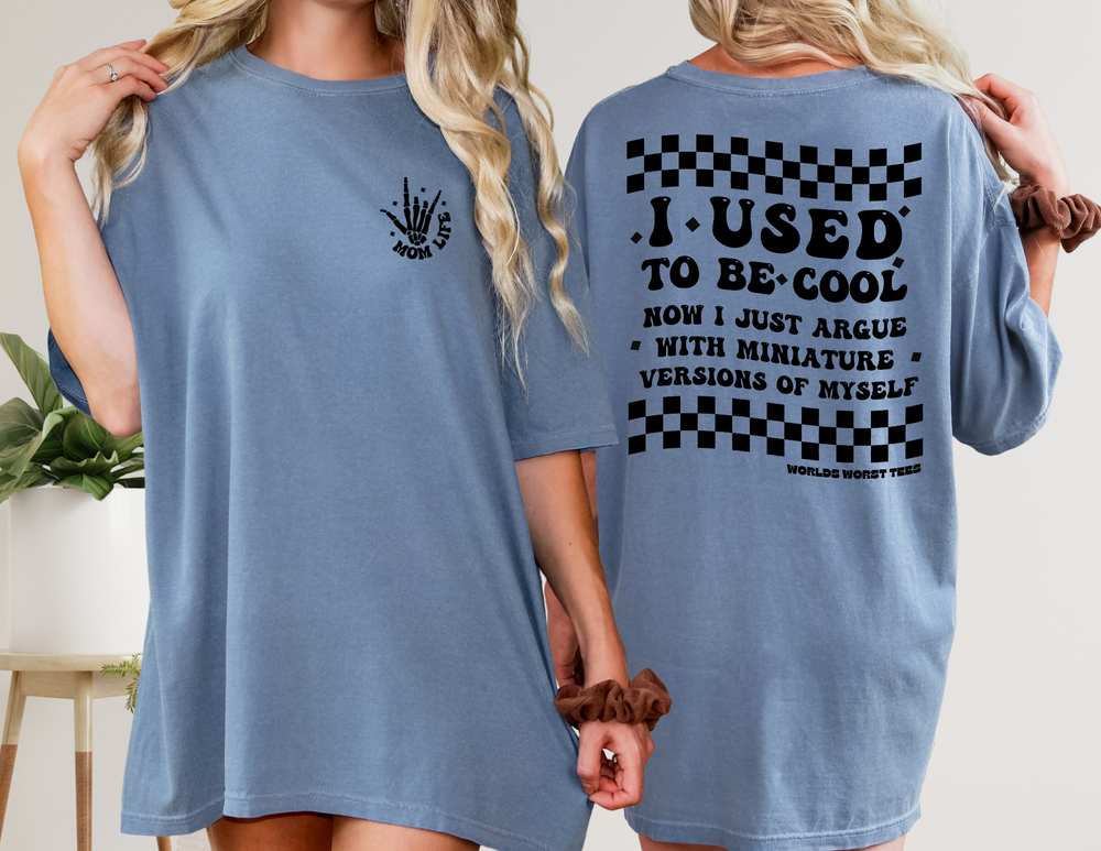 A relaxed fit I Used to Be Cool Mom Tee, crafted from 100% ring-spun cotton. Garment-dyed for extra coziness, featuring double-needle stitching for durability and a seamless design.
