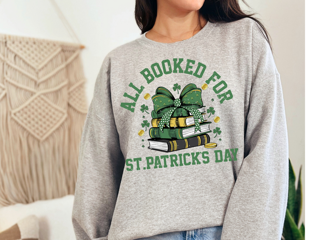 Booked Up for St. Patrick's Day Crew sweatshirt, worn by a person, showcasing a comfortable, unisex design with a ribbed knit collar and seamless sides.