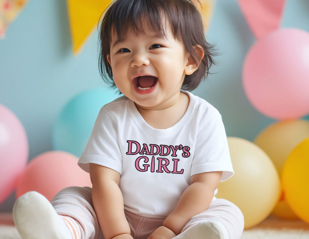 Baby wearing a Daddy's Girl infant tee, showcasing its comfortable fit and durable design, perfect for toddlers.