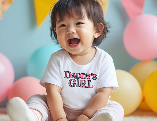 Baby wearing a Daddy's Girl infant tee, showcasing its comfortable fit and durable design, perfect for toddlers.