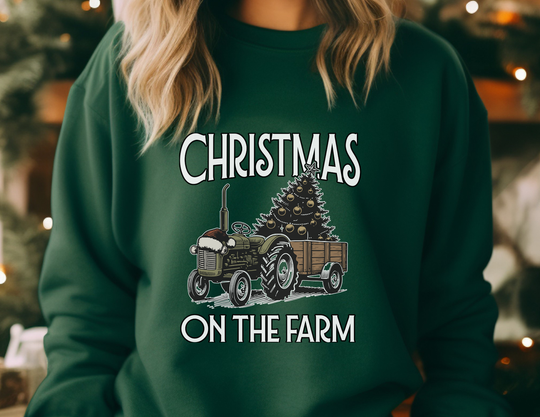 Christmas on the Farm Crew: Dark green sweatshirt with vintage tractor and Christmas tree design, perfect for cozy, festive wear.