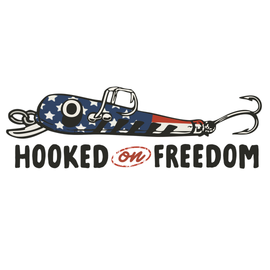 Graphic-style Hooked on Freedom Tee featuring a stars-and-stripes fishing lure illustration with twin hooks and slogan, highlighting a patriotic theme.