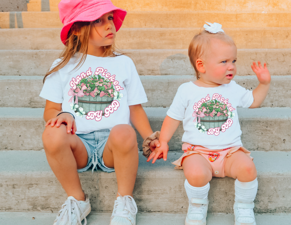 Hand Picked by GOD Toddler Tee, featuring soft 100% Airlume cotton, short sleeves, and tear-away label, perfect for everyday wear.