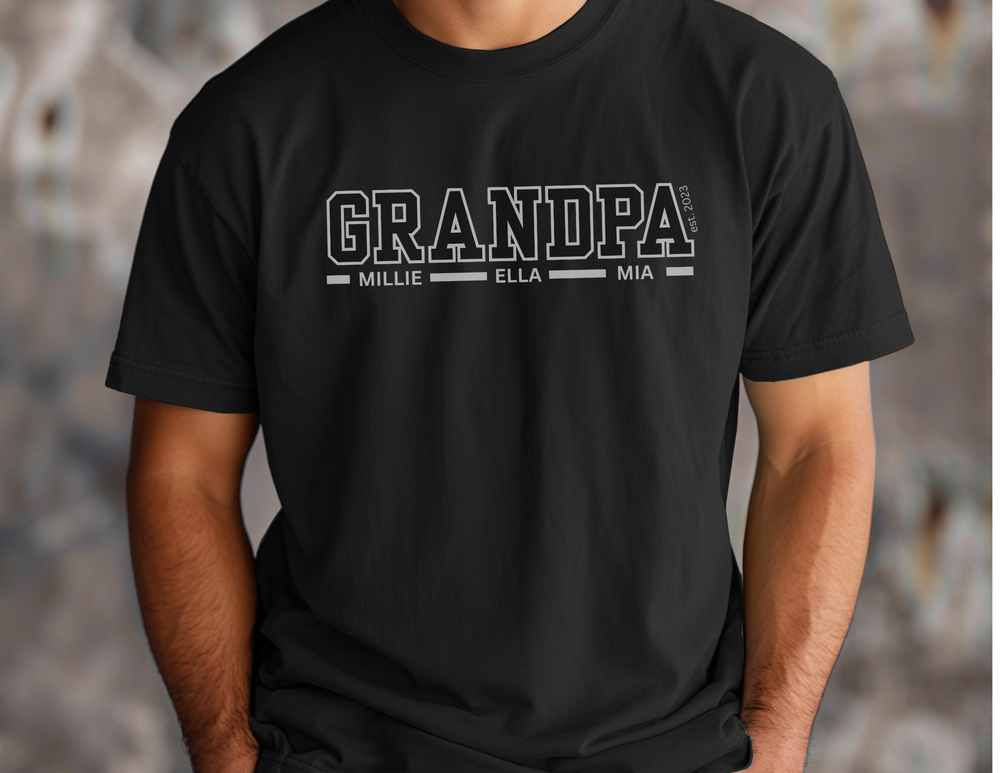 Man wearing a Grandpa Customizable Tee, a relaxed-fit, garment-dyed t-shirt by Comfort Colors, showcasing its soft texture and durable design.