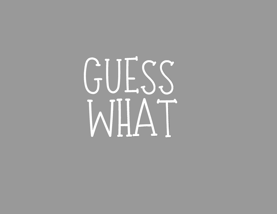 Gray background with 'GUESS WHAT' in white letters on Youth DryBlend® T-Shirt, offering durability, comfort, and eco-friendly features.