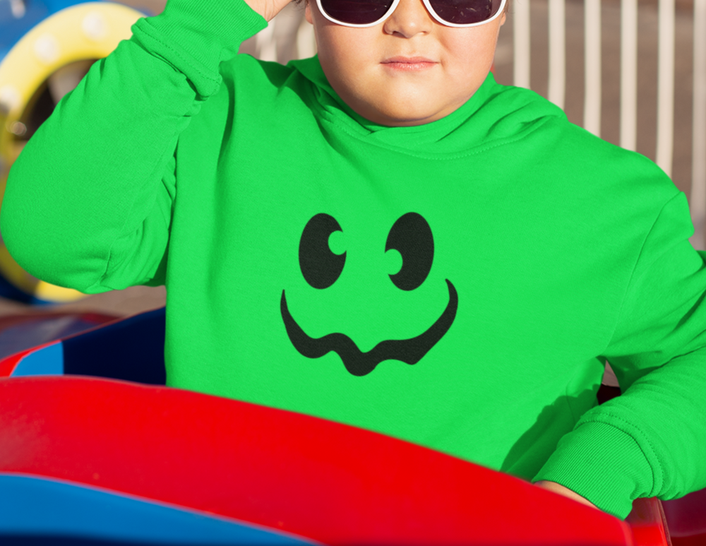 Child wearing Ghoul Youth Hoodie with sunglasses, green sweatshirt. Soft cotton-polyester blend, kangaroo pocket, twill taping, regular fit. Perfect for kids.