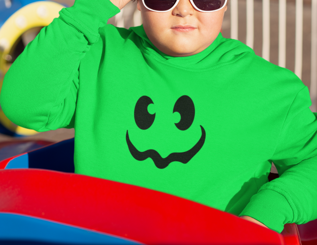 Child wearing Ghoul Youth Hoodie with sunglasses, green sweatshirt. Soft cotton-polyester blend, kangaroo pocket, twill taping, regular fit. Perfect for kids.
