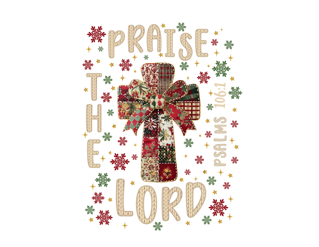 Praise the Lord Tee featuring a patchwork cross with festive ribbon, surrounded by snowflake and star motifs, and Psalms 106:1 scripture reference.