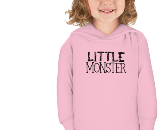 A toddler hoodie featuring a Little Monster design, with jersey-lined hood, cover-stitched details, and side seam pockets for cozy comfort. Made of 60% cotton and 40% polyester for durability and softness.