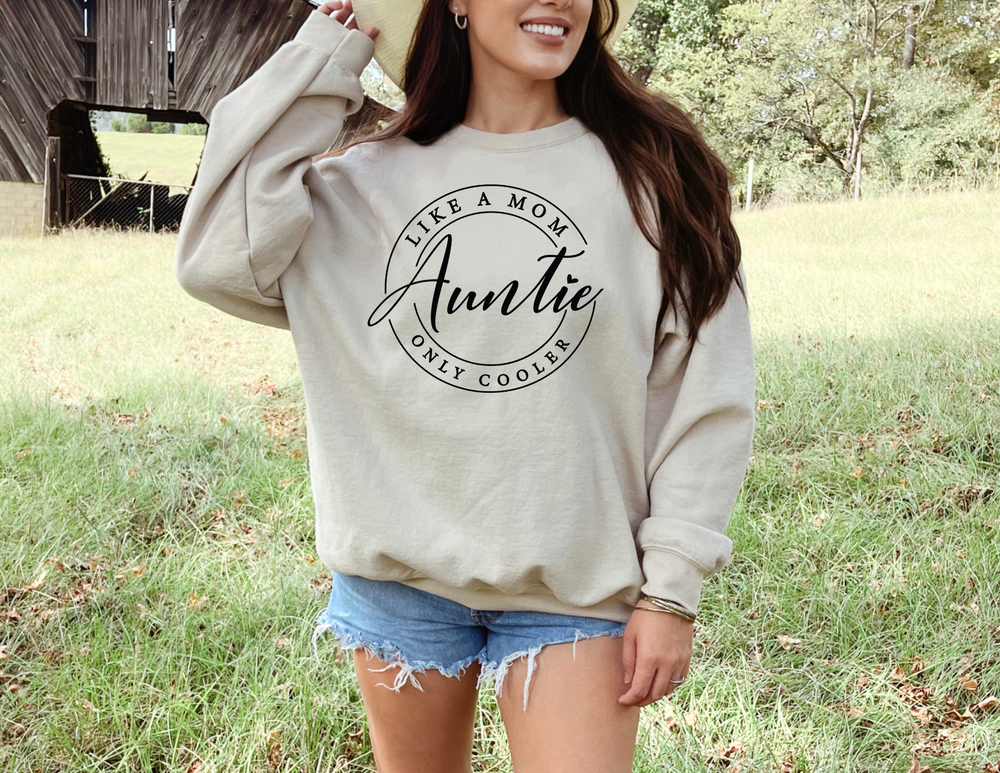 Woman wearing Auntie Crew sweatshirt, showcasing a relaxed fit and ribbed collar, ideal for comfort in casual settings.