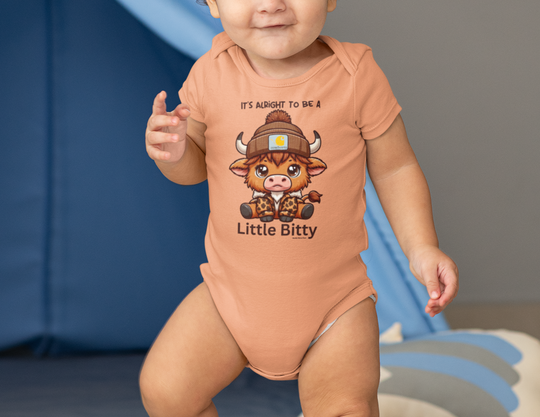 A baby wearing a Little Bitty Onesie, a soft and durable infant fine jersey bodysuit. Made of 100% cotton, featuring ribbed bindings and plastic snaps for easy changing. Perfect for little ones.