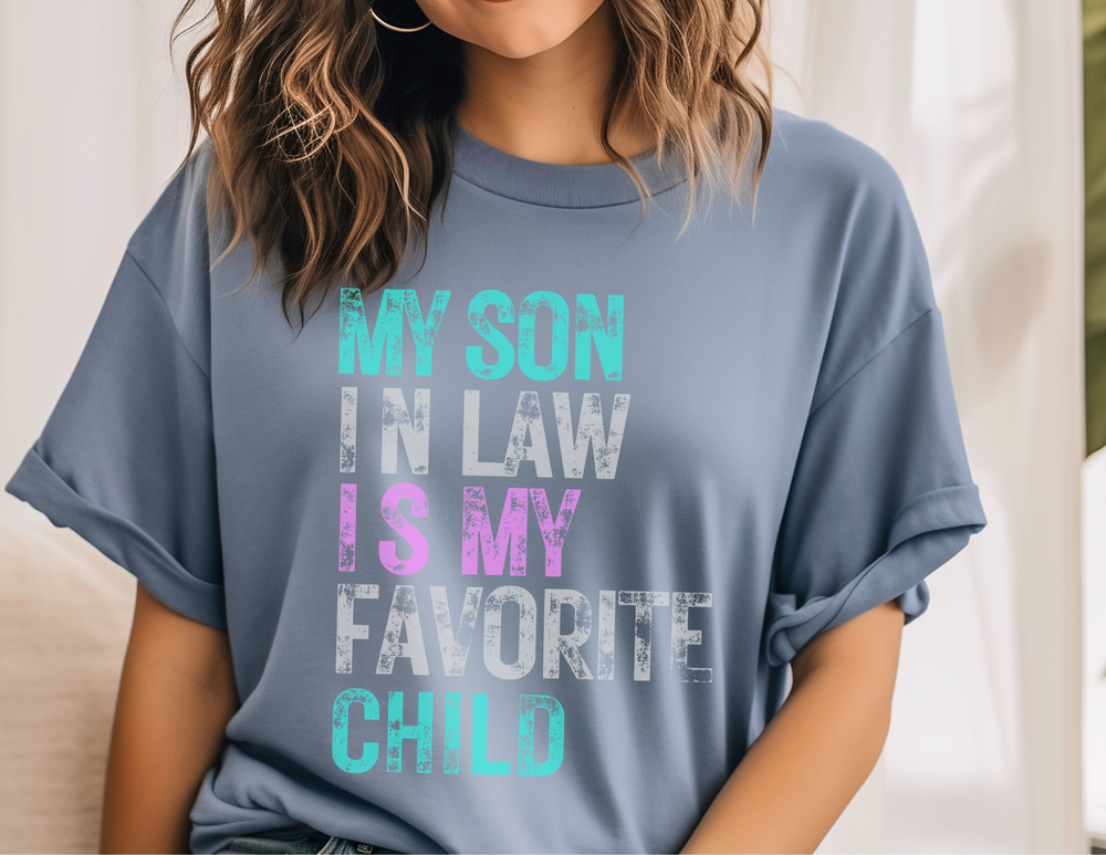 Relaxed fit tee, My Son In Law is My Favorite Child, 100% ring-spun cotton, garment-dyed for coziness. Durable double-needle stitching, no side-seams for tubular shape. Sizes S-3XL.