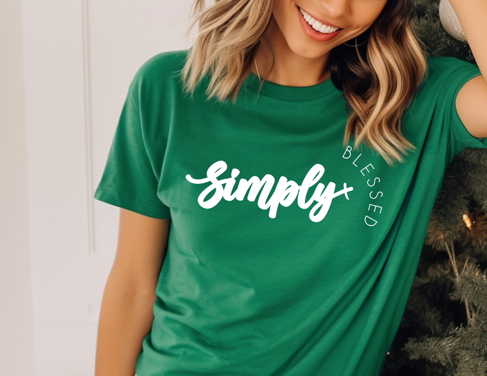 Woman wearing Simply Blessed Tee, smiling. The tee is a classic unisex jersey with ribbed knit collar and dual side seams, offering a comfortable retail fit.