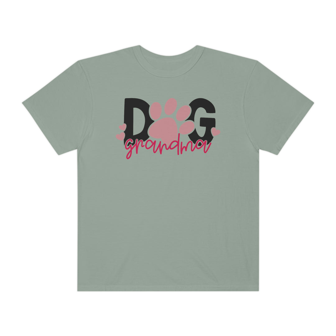 A cozy Dog Grandma Tee in grey, featuring a paw print design. Made of 100% ring-spun cotton with double-needle stitching for durability and a relaxed fit for daily comfort.