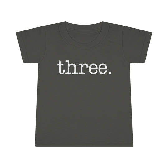 Three Toddler Tee with classic fit and high stitch density for durability. Features 3/4 double-needle topstitched collar and double-needle sleeve and bottom hems. Made of 100% Ringspun cotton.