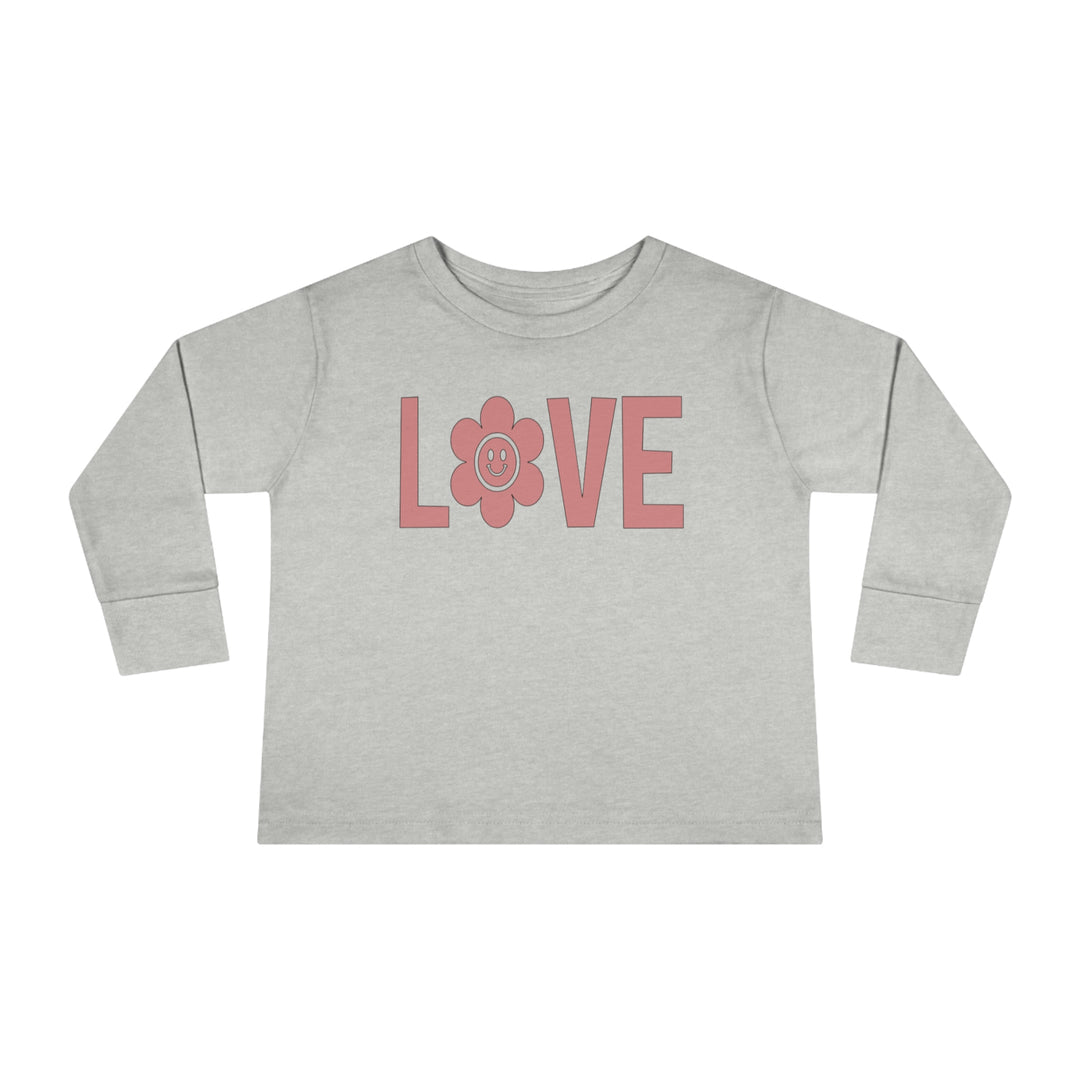 Love Toddler Long Sleeve Tee featuring grey shirt with pink letters and a flower. 100% combed ringspun cotton, topstitched ribbed collar, and shoulder-to-shoulder self-fabric back-neck taping for durability and comfort.