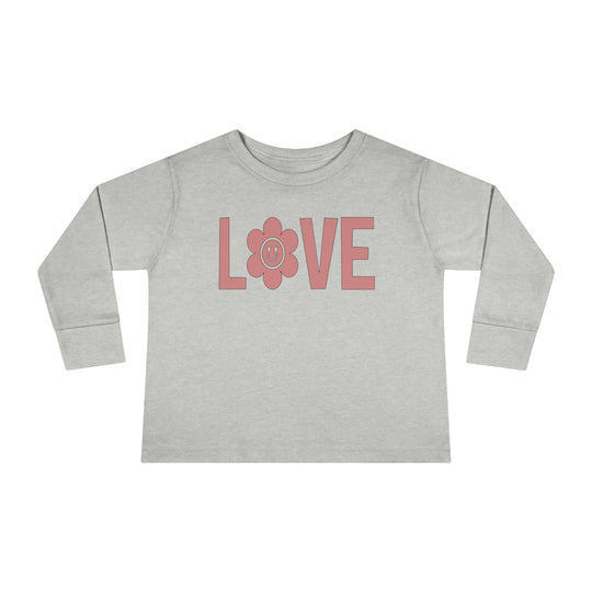 Love Toddler Long Sleeve Tee featuring grey shirt with pink letters and a flower. 100% combed ringspun cotton, topstitched ribbed collar, and shoulder-to-shoulder self-fabric back-neck taping for durability and comfort.