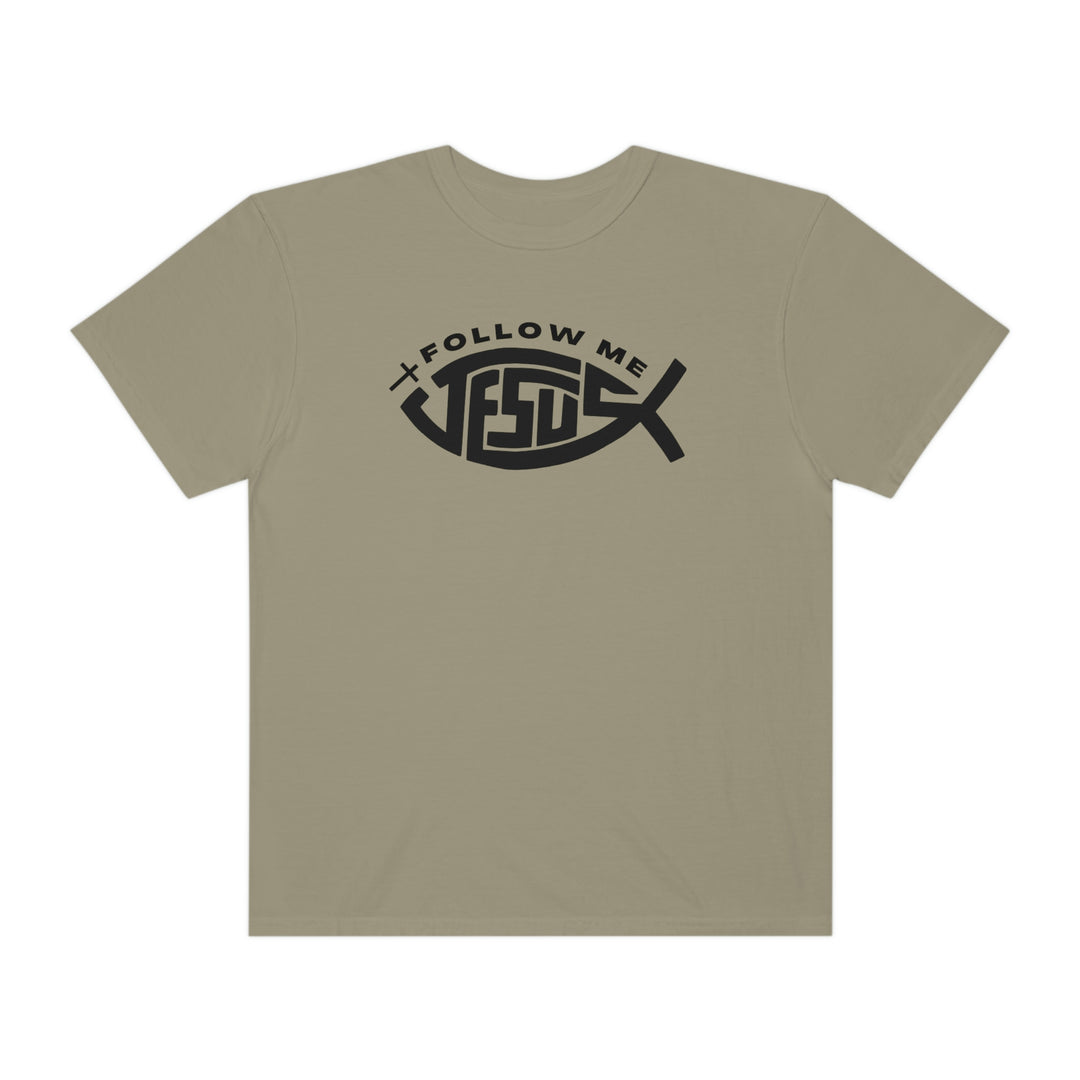 A relaxed-fit Jesus Follow Me Tee, crafted from 100% ring-spun cotton. Garment-dyed for extra coziness, featuring double-needle stitching and a seamless design for durability and comfort.
