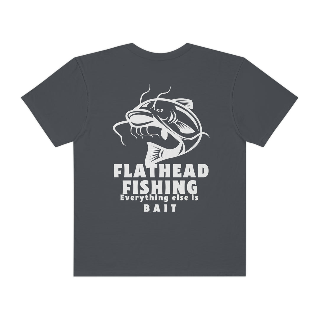 Alt text: Flathead Fishing Unisex Tee by Comfort Colors: Back view of a grey shirt with a fish logo and white text. 100% ring-spun cotton, relaxed fit, durable double-needle stitching, seamless design.