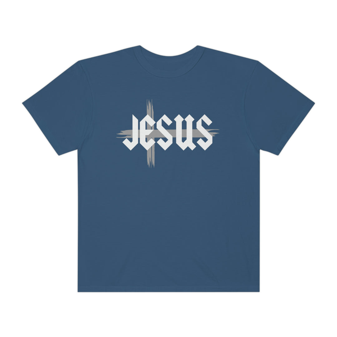 A Jesus Tee in blue with white text, made of 100% ring-spun cotton. Garment-dyed for extra coziness, featuring a relaxed fit and double-needle stitching for durability. No side-seams for a tubular shape.