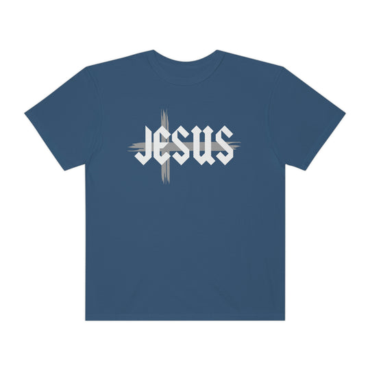 A Jesus Tee in blue with white text, made of 100% ring-spun cotton. Garment-dyed for extra coziness, featuring a relaxed fit and double-needle stitching for durability. No side-seams for a tubular shape.