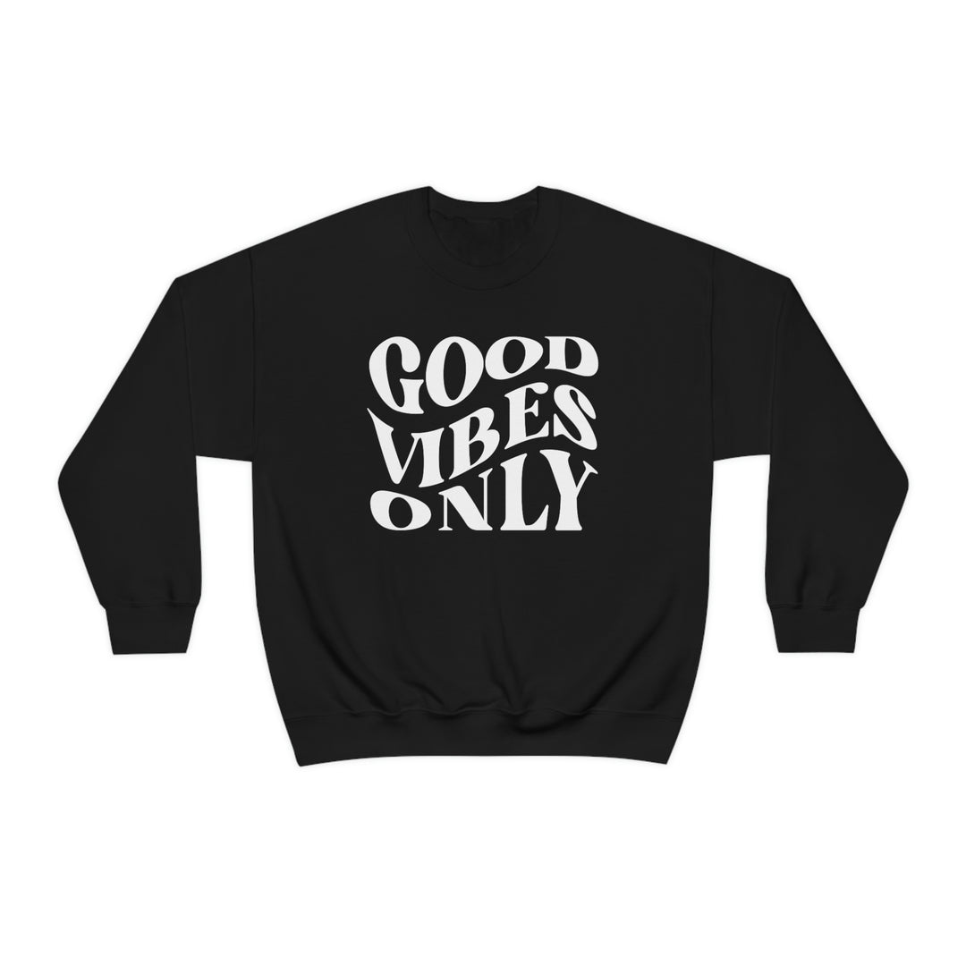 A unisex heavy blend crewneck sweatshirt featuring Good Vibes Only text. Comfortable, ribbed knit collar, no itchy seams. 50% cotton, 50% polyester, loose fit, sewn-in label. Ideal for everyday wear.
